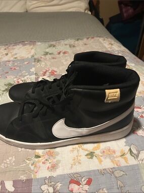 Nike Men’s Black High-Top Sneakers with White Swoosh